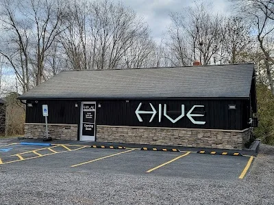 HIVE cannabis dispensary building exterior in Chelsea, Maine — HIVE signage and storefront